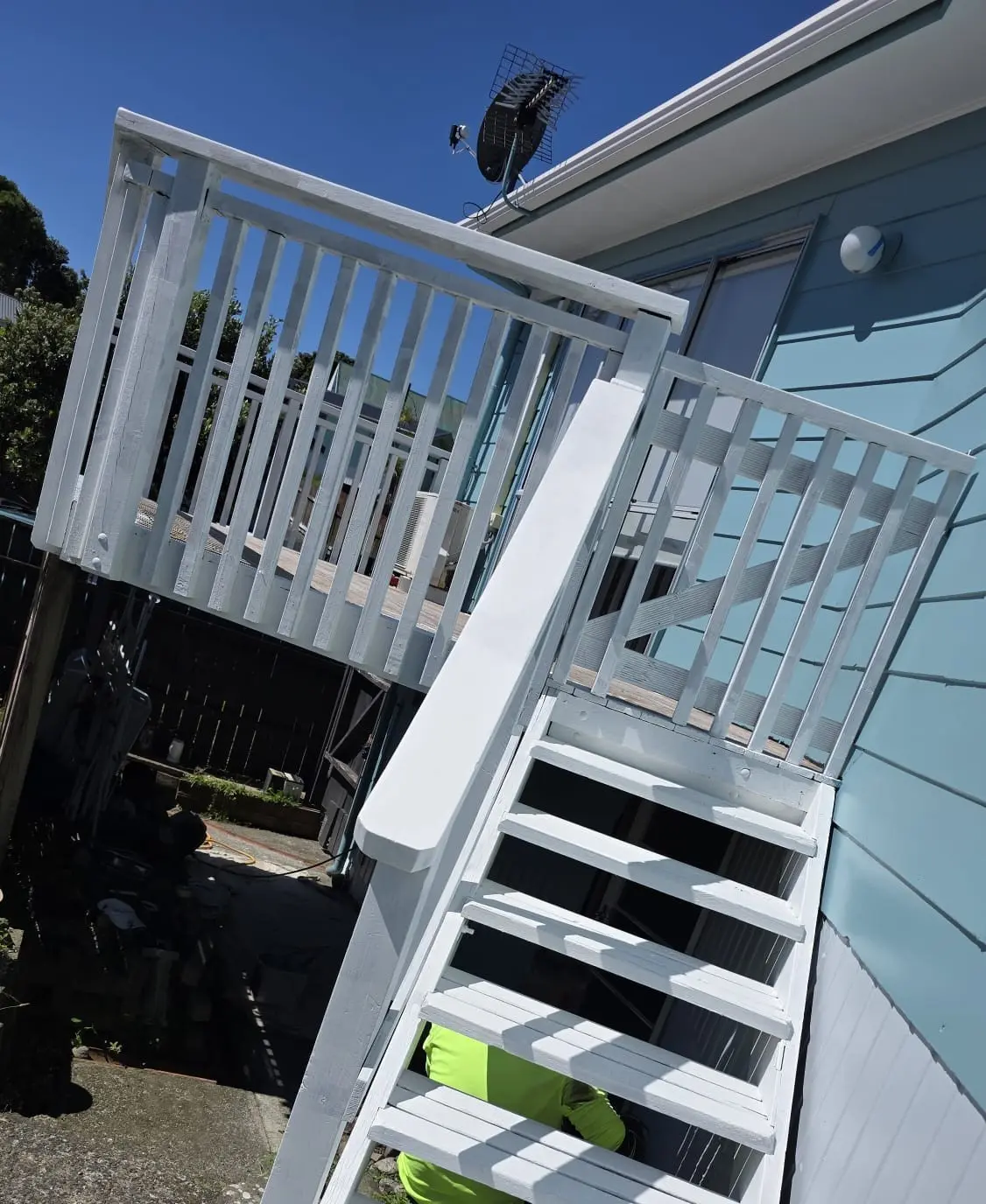 RR Painters craftsman applying a premium finish to an interior wall